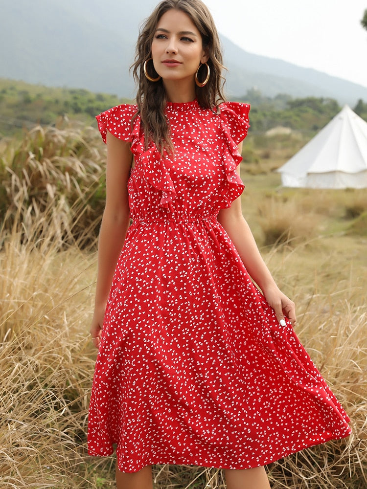 Vestido acampanado con volantes y estampado floral. Vestido para mujer.